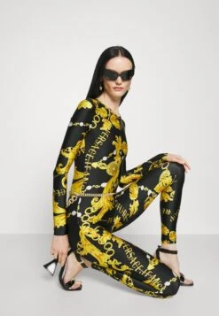 Lycra Chain Couture - Jumpsuit - Black/Gold 11 Lycra Chain Couture - Jumpsuit - Black/Gold -Ulla Popken Winkel 5d3e59daf0174a19a44e4a529aa297e9